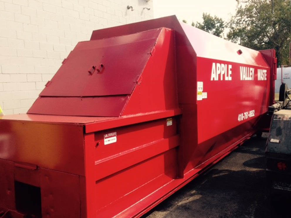 Apple Valley Waste trash compactor.