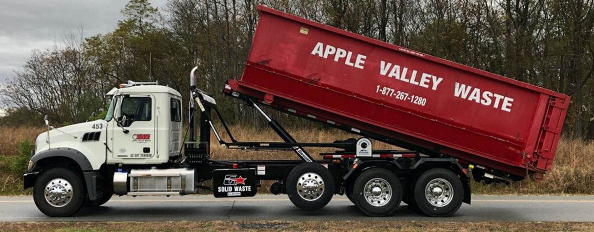 Apple Valley Waste Roll Off truck and container.