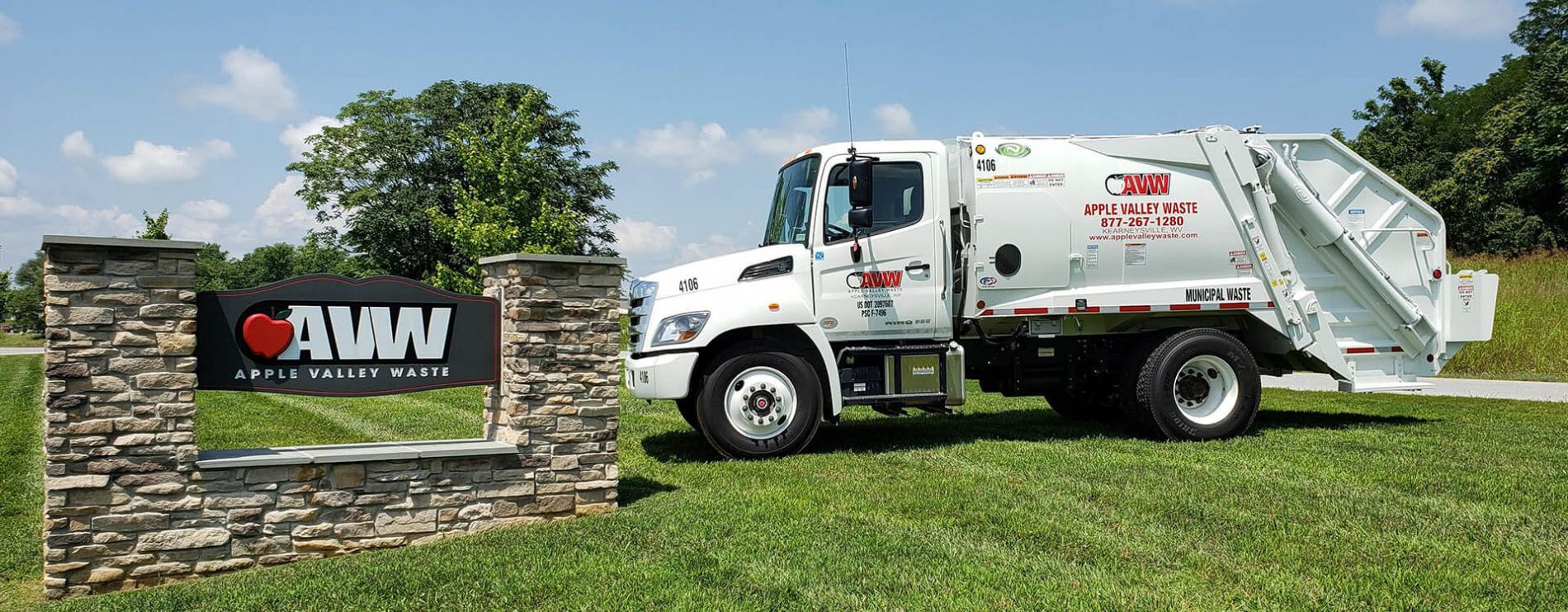 Apple Valley Waste truck and sign.